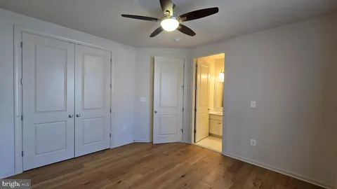 a view of a house with wooden deck