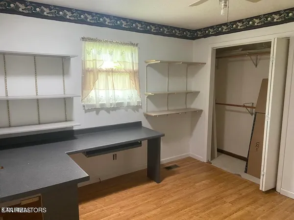 a room with storage and utility