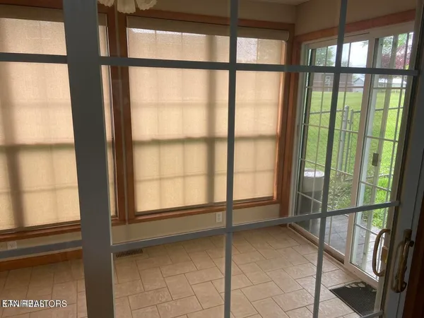 a kitchen with granite countertop a refrigerator and a stove