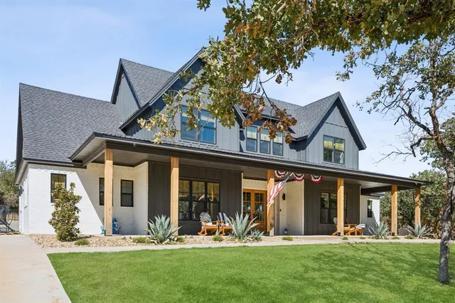 front view of a house with a yard