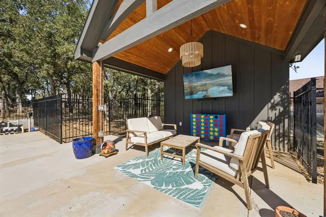 a outdoor space with patio the couches and a potted plant on a table