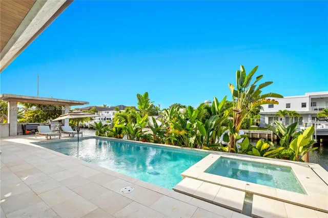 a view of a balcony with two chairs