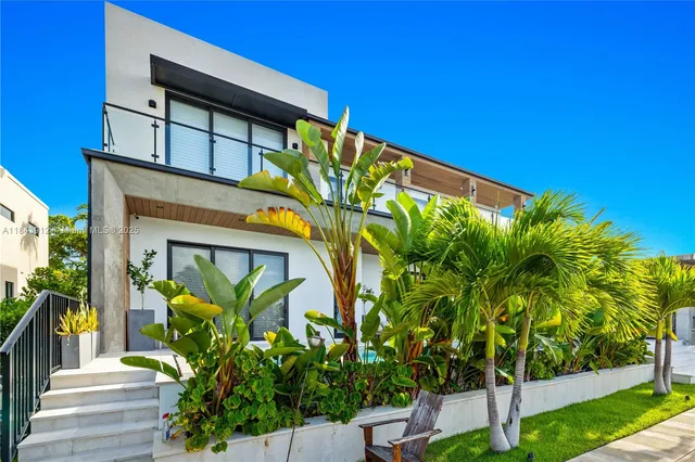 a view of a building with a tree
