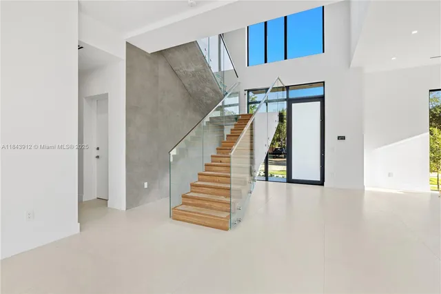 a view of a hallway with staircase
