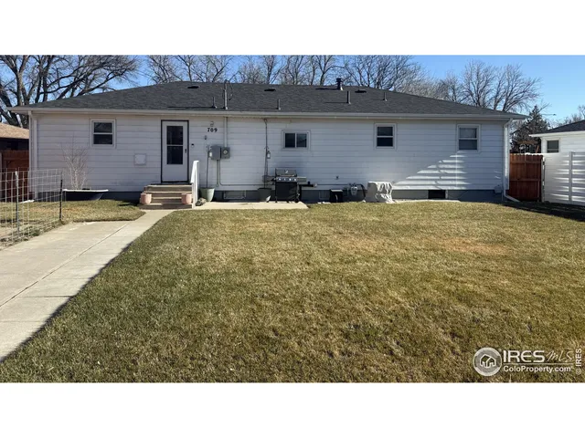a black and white photo of a house
