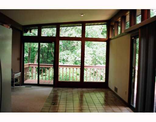 226 Goldsmith Road Pittsburgh, PA 15237 - Photo 4 of 8 View. From kitchen eating area & family room view, vaulted ceiling, ceramic tifle floor, two entrances to rear deck