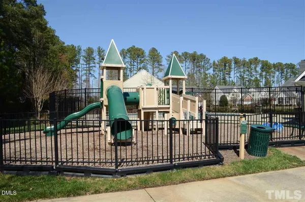 a view of a wrought iron fences in front of house