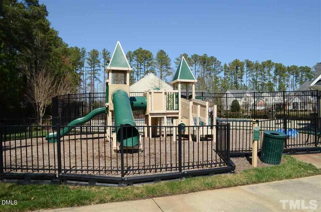 a view of a wrought iron fences in front of house