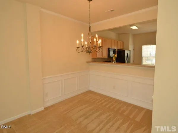 a view of a room with a chandelier