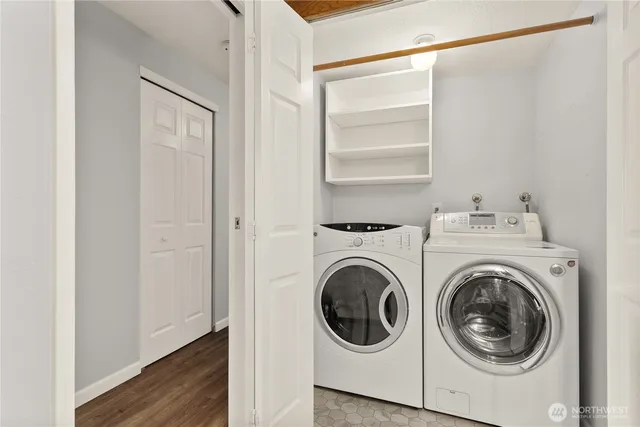 a utility room with dryer and washer