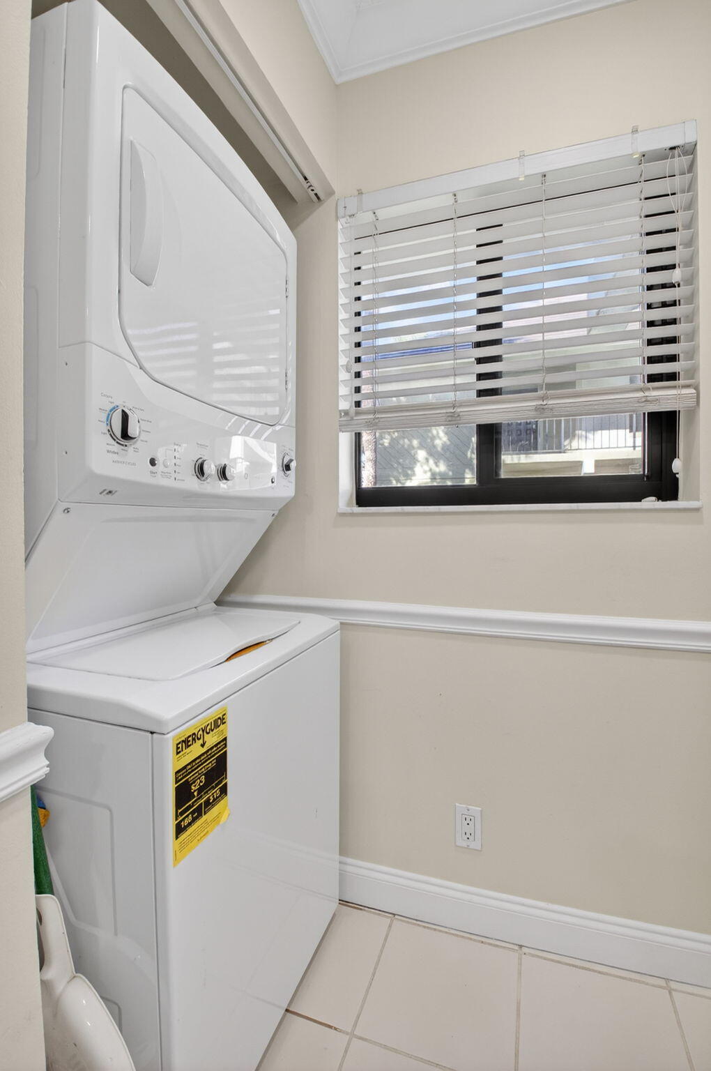159 Northwest 70th Street, Unit 403 Boca Raton, FL 33487 - Photo 19 of 30 a bathroom with a bathtub and a window