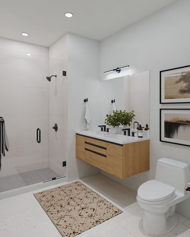 1395 Washington Street, Unit 306 Boston, MA 02118 - Photo 13 of 23 a bathroom with a sink and mirror