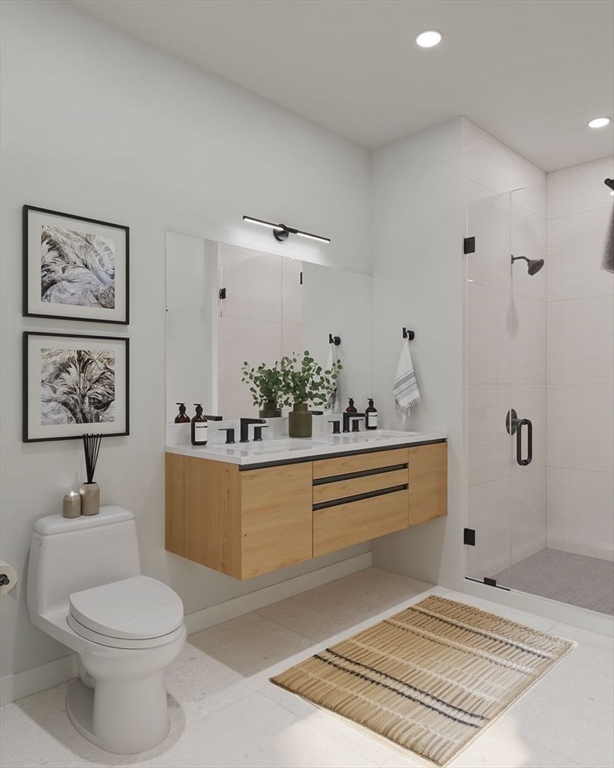1395 Washington Street, Unit 306 Boston, MA 02118 - Photo 9 of 23 a bathroom with a sink a toilet and shower