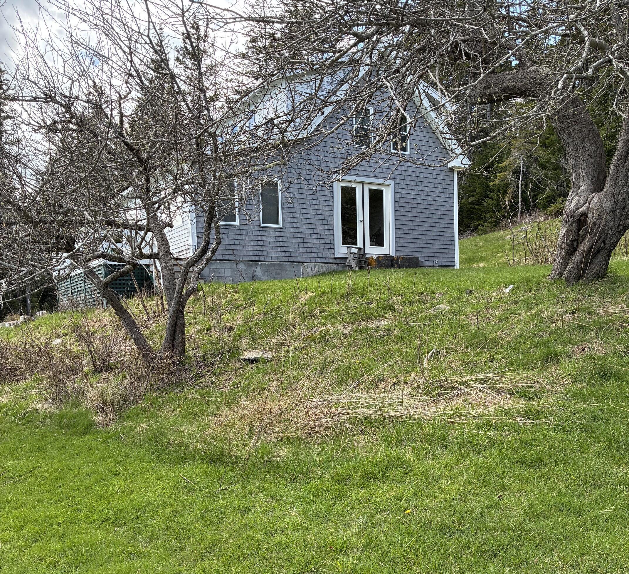 32 Bakeman Road Brooksville, ME 04642 - Photo 9 of 22 Bakeman north side of house cropped