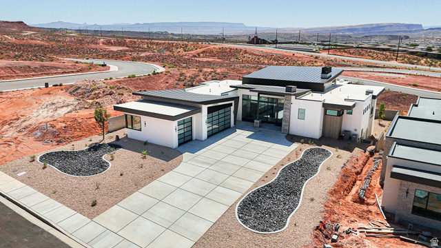 234 Colima Road, Unit 144 Washington, UT 84780 - Photo 9 of 21 Modern exterior architecture featuring a flat roof and white stucco finish