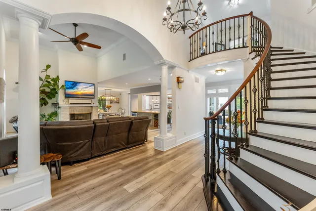 a kitchen with stainless steel appliances kitchen island granite countertop a sink and cabinets