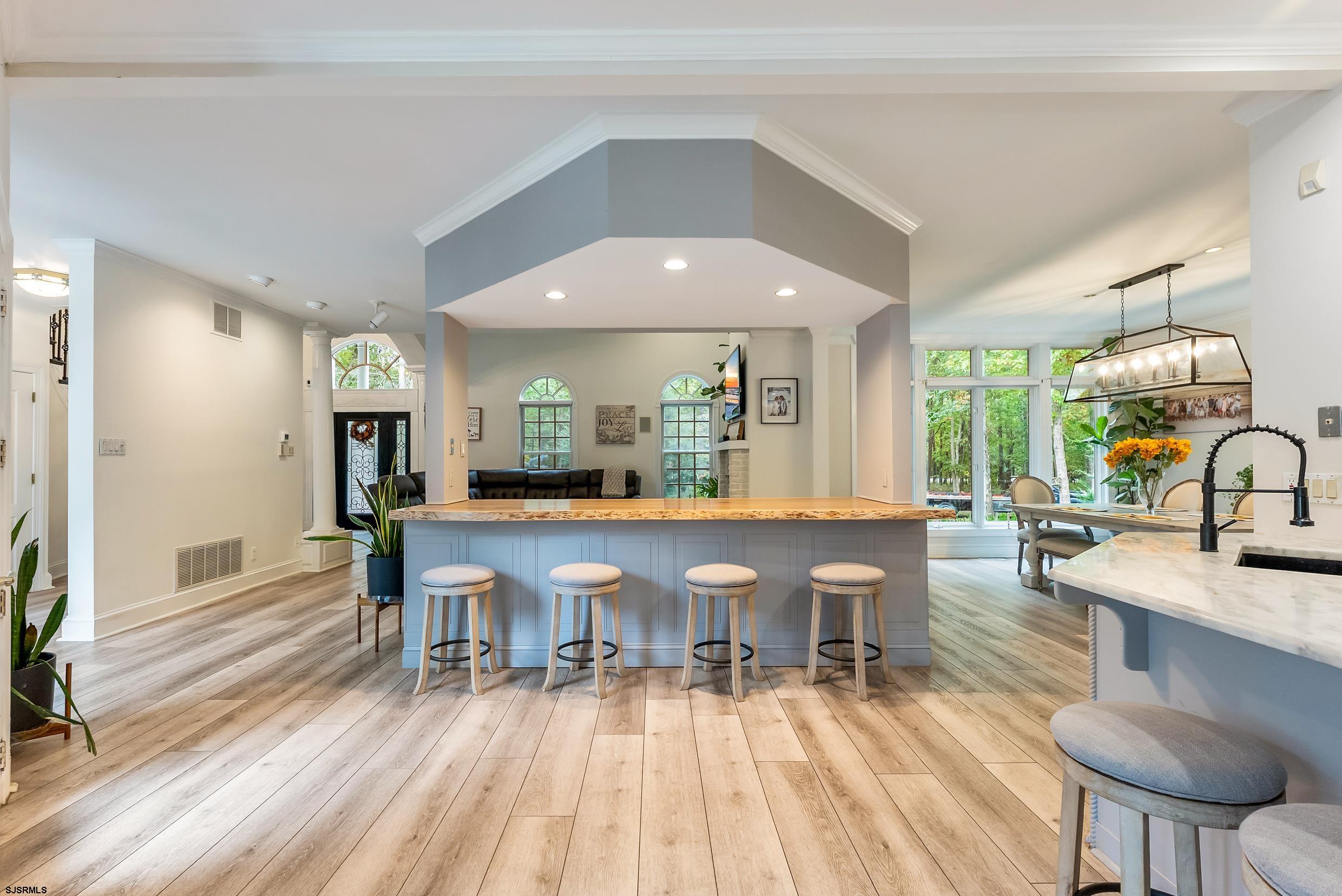 535 West Cologne Port Road Port Republic, NJ 08215 - Photo 38 of 99 a view of a dining room with furniture window and wooden floor