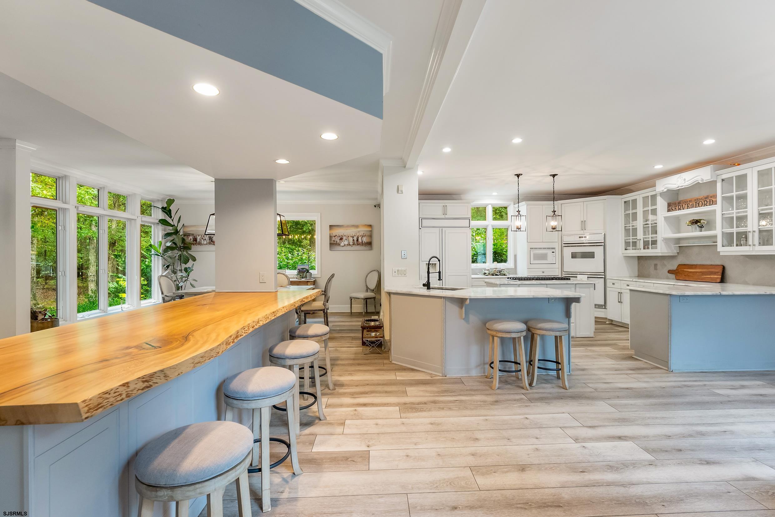 535 West Cologne Port Road Port Republic, NJ 08215 - Photo 40 of 99 a kitchen with a table and chairs in it