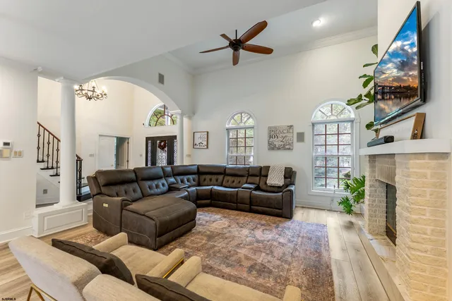 an aerial view of a house with outdoor space and parking