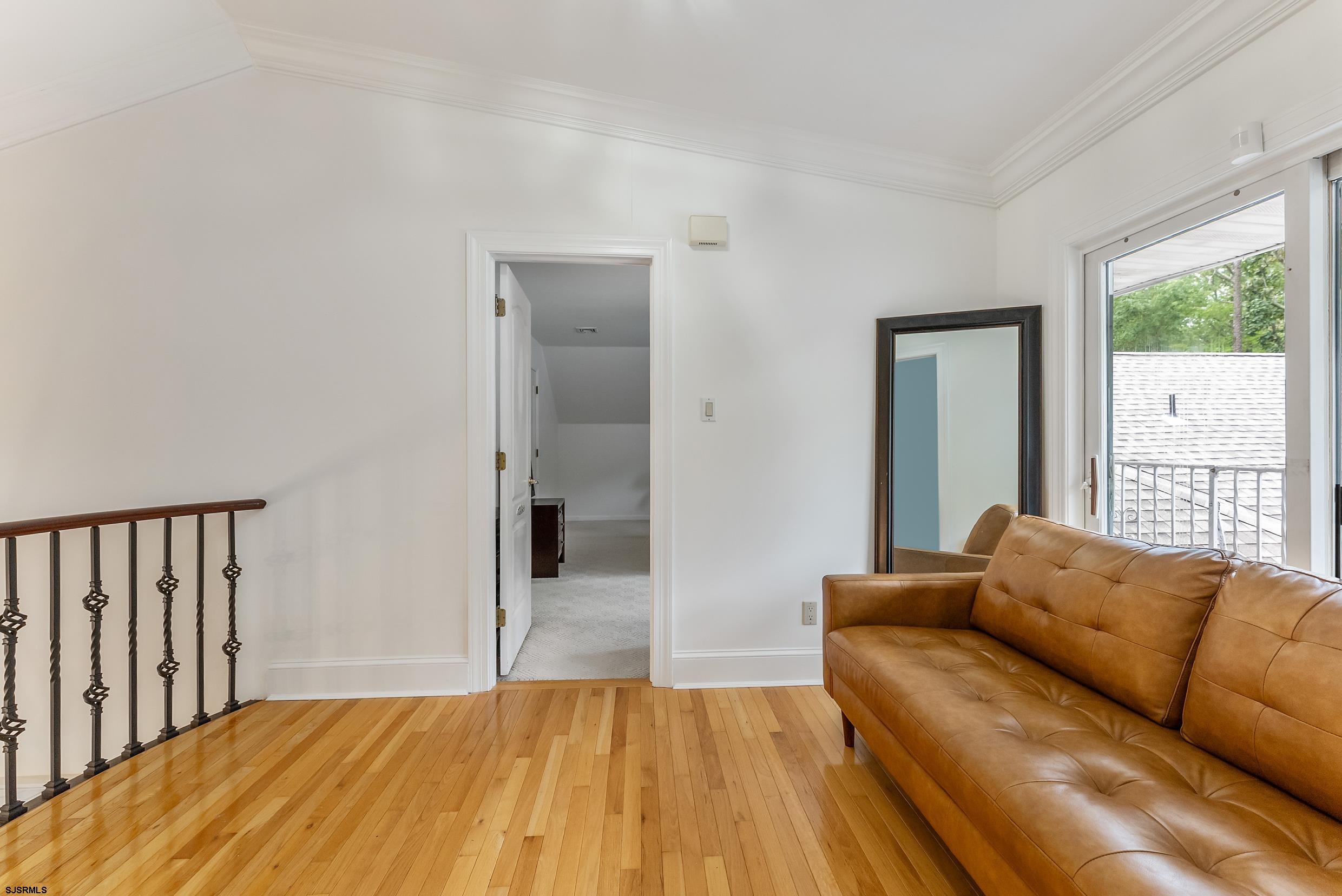 535 West Cologne Port Road Port Republic, NJ 08215 - Photo 55 of 99 a living room with a couch and a window