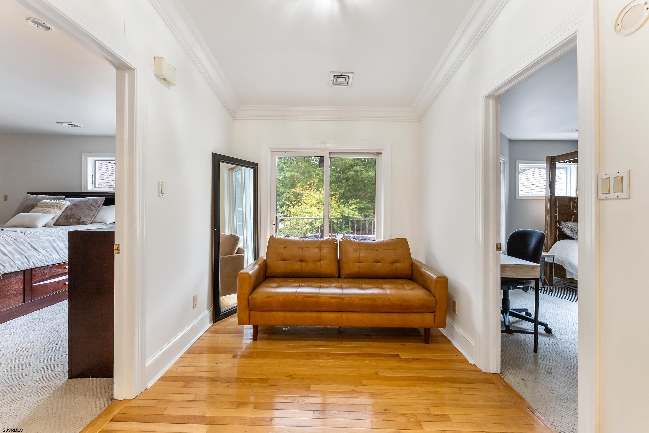 535 West Cologne Port Road Port Republic, NJ 08215 - Photo 64 of 99 a living room with furniture and a rug