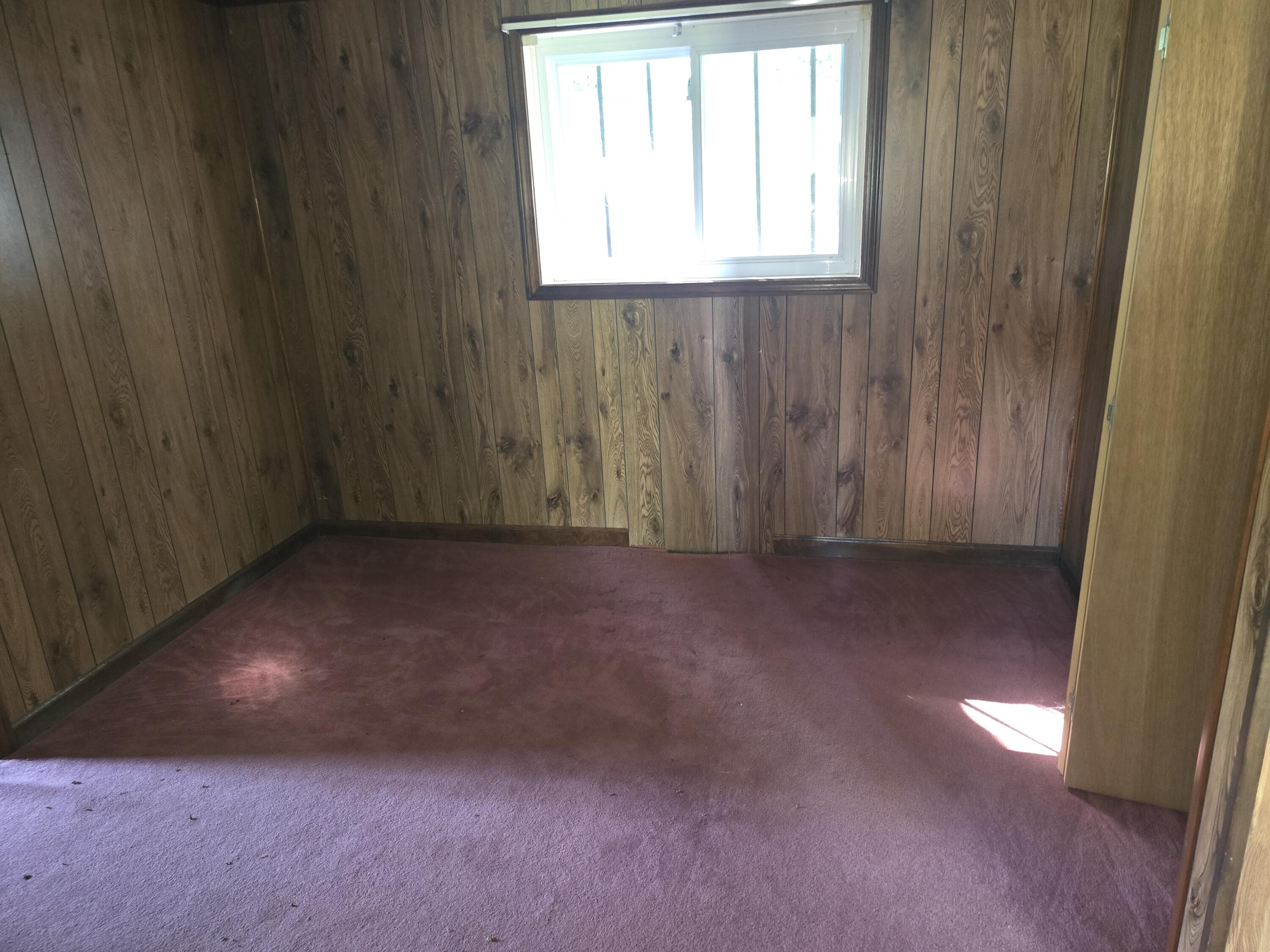 415 Stock Pen Mountain Road Narrows, VA 24124 - Photo 9 of 16 an empty room with windows