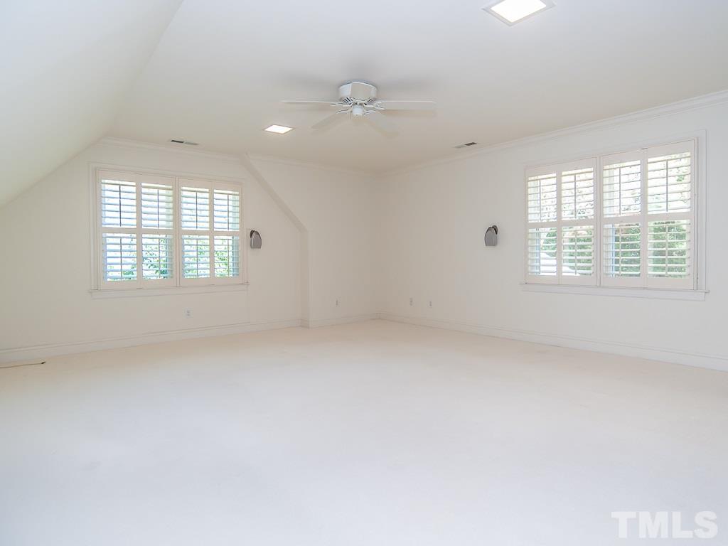 6920 Slade Hill Road Raleigh, NC 27615 - Photo 22 of 30 an empty room with a window