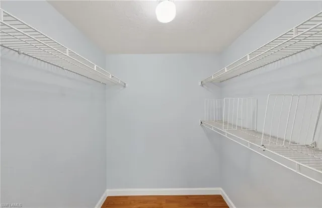 a view of a room with racks on the wall