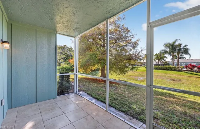 a view of a room with a large window