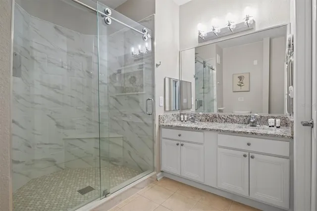 a bed room with a bed and a window