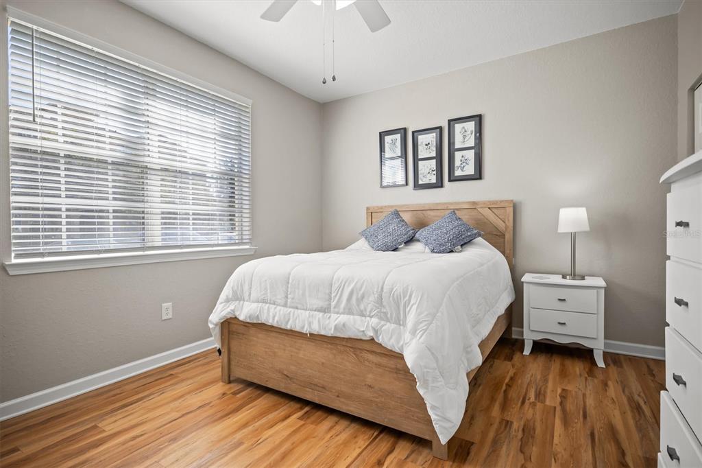 301 Terrace Ridge Circle, Unit 301 Davenport, FL 33896 - Photo 20 of 35 a bed room with a bed and a window
