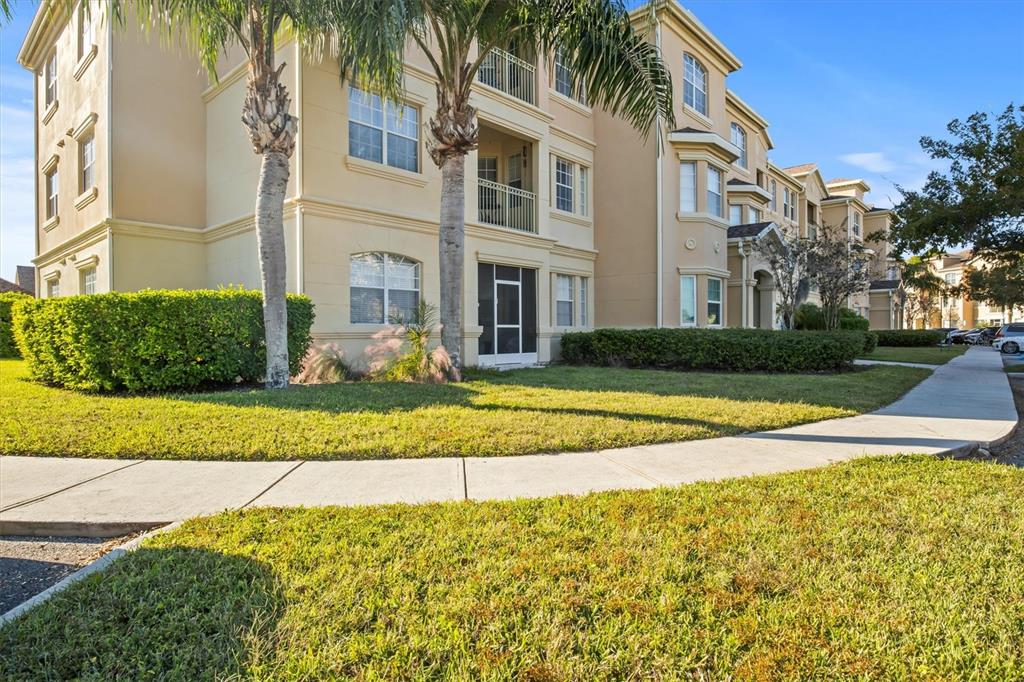301 Terrace Ridge Circle, Unit 301 Davenport, FL 33896 - Photo 27 of 35 a view of a house with a swimming pool