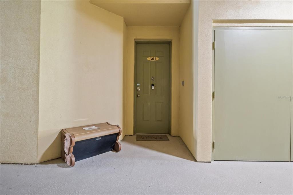 301 Terrace Ridge Circle, Unit 301 Davenport, FL 33896 - Photo 28 of 35 a room with a door