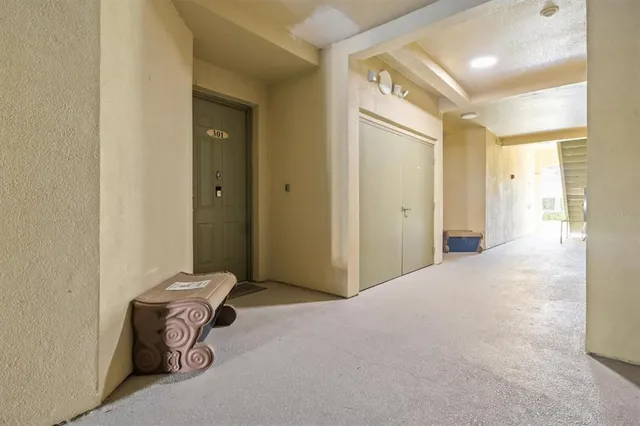 a kitchen with stainless steel appliances a sink stove and refrigerator
