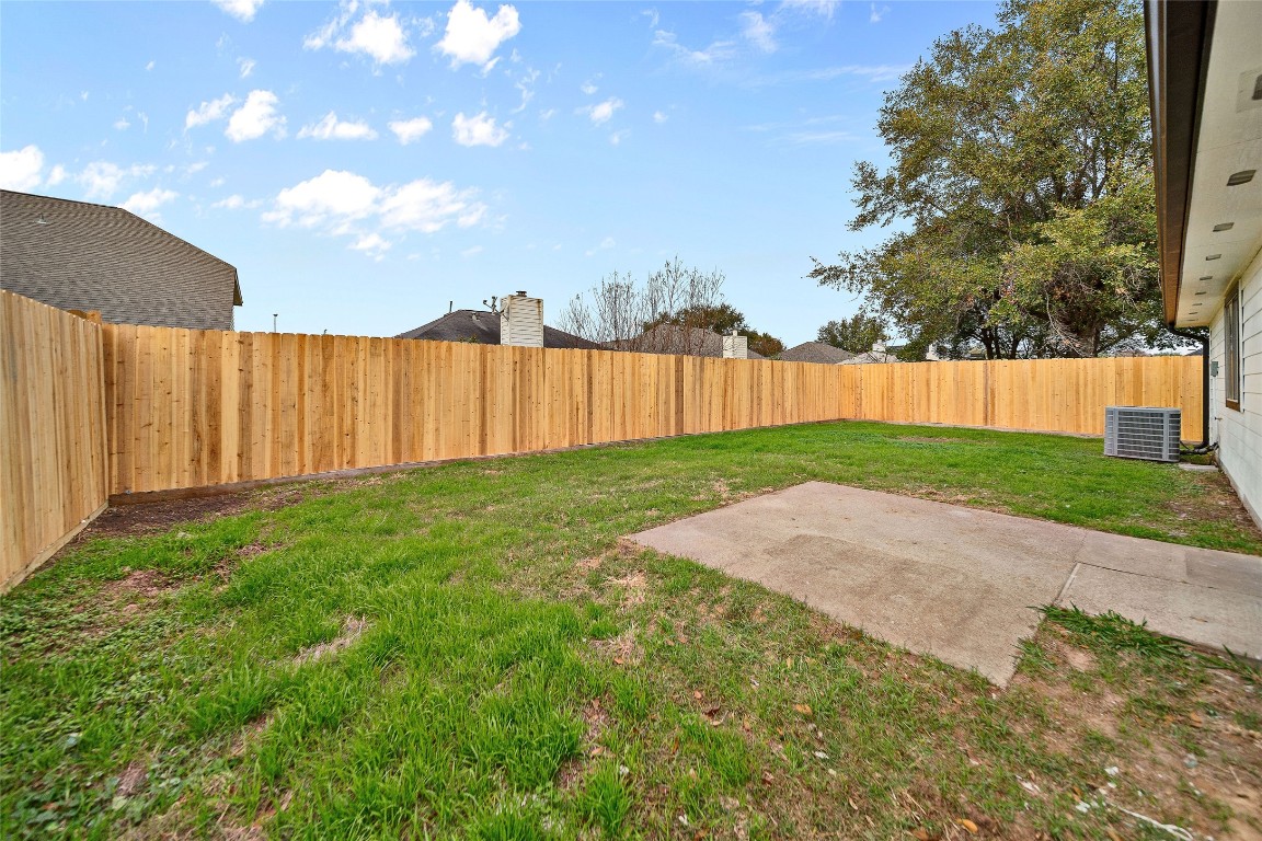 6627 Greenhouse Road Katy, TX 77449 - Photo 21 of 23 a view of backyard with swimming pool and outdoor seating