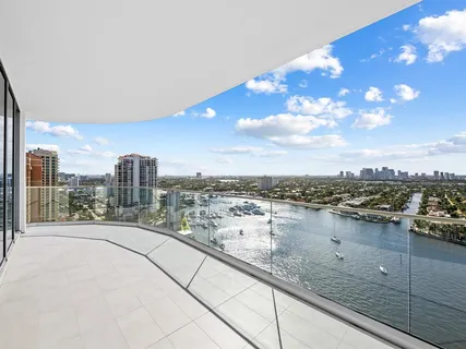 a view of a balcony with an ocean view