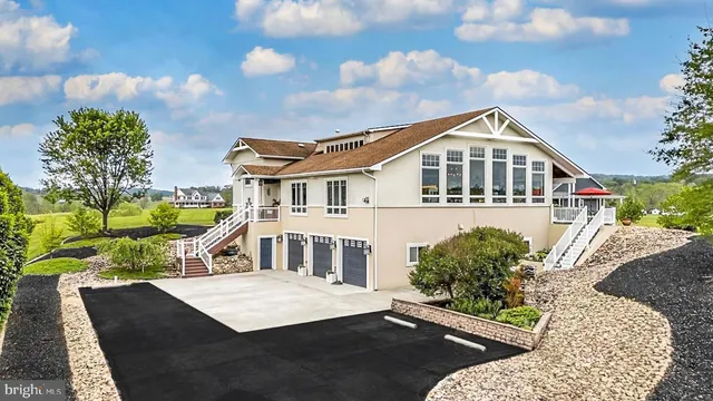 a view of multiple houses with city street