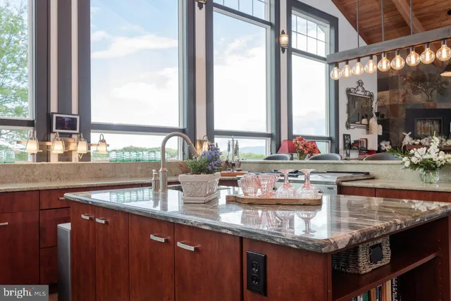 a bathroom with a toilet a sink and shower