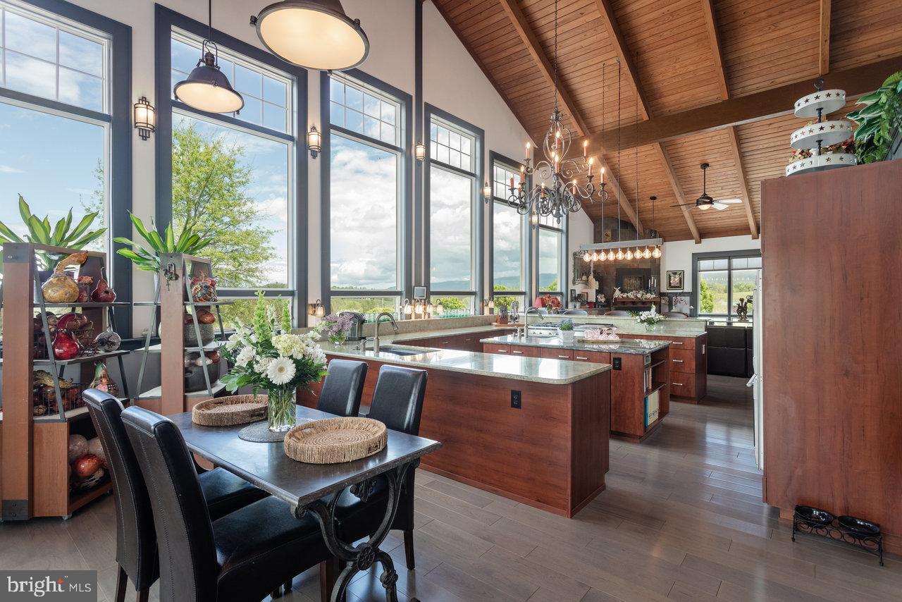 1934 Quicksburg Road Quicksburg, VA 22847 - Photo 16 of 103 a kitchen with a table and chairs in it