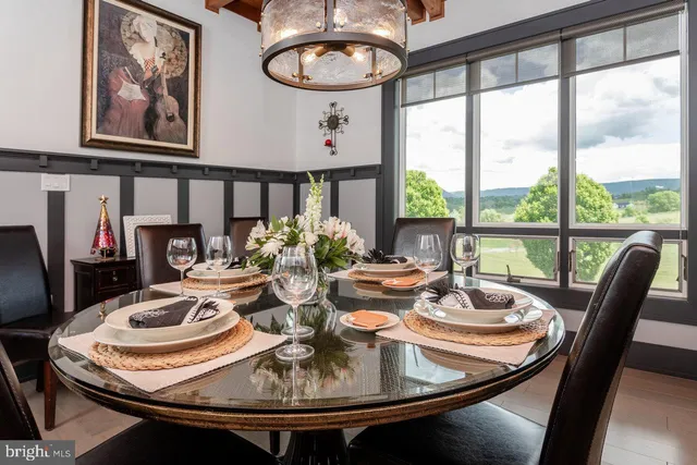 a view of a big yard with swimming pool and green space