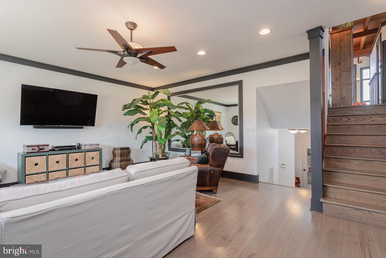 1934 Quicksburg Road Quicksburg, VA 22847 - Photo 61 of 103 a living room with furniture and a flat screen tv