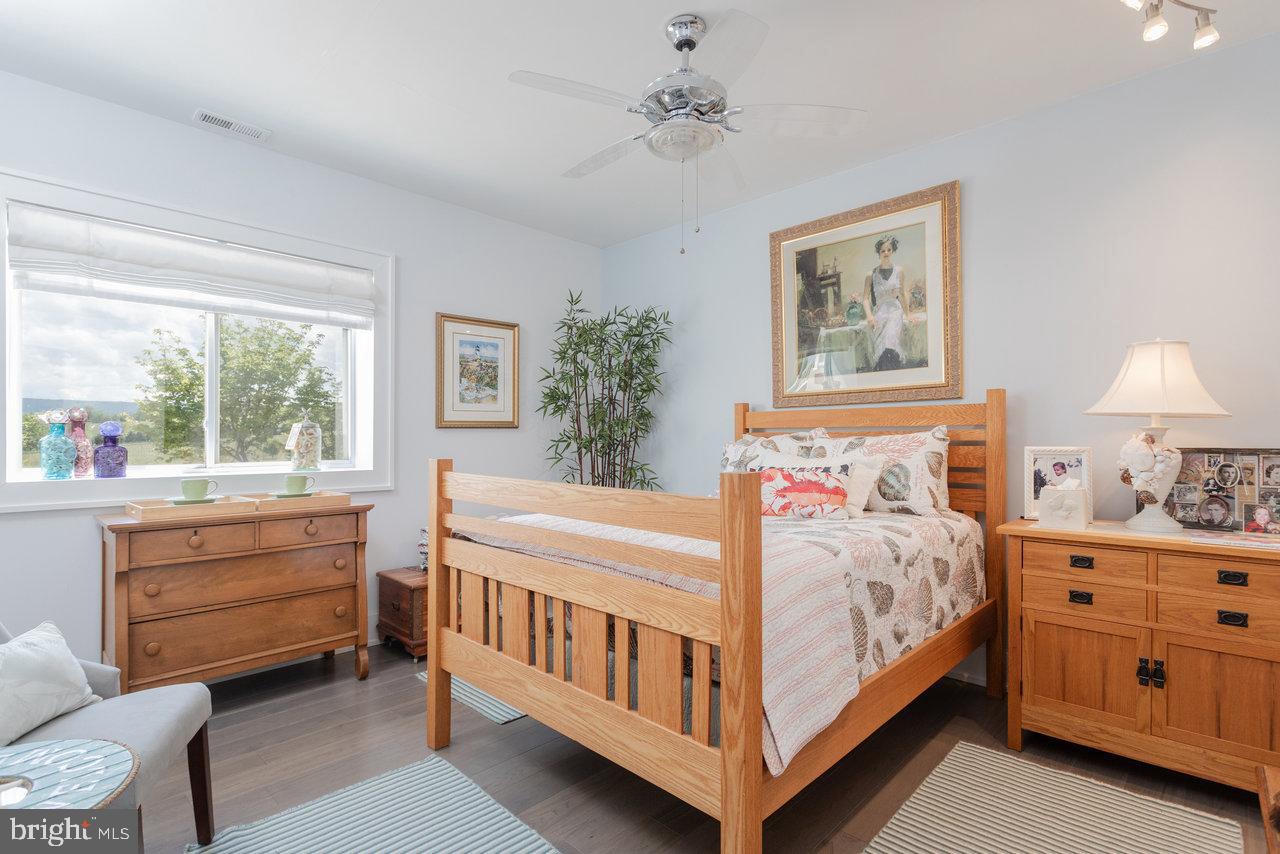 1934 Quicksburg Road Quicksburg, VA 22847 - Photo 65 of 103 a bedroom with a bed and a window