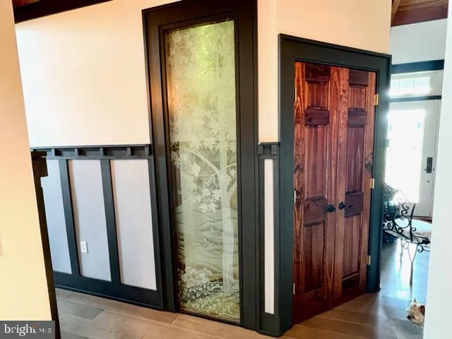 a kitchen with a table and chairs in it