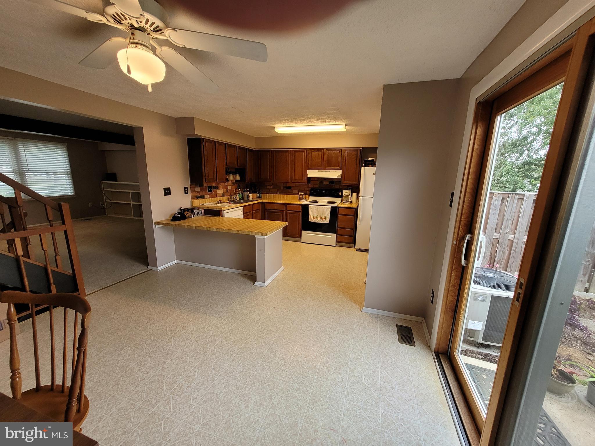 1788 Springfield Lane Frederick, MD 21702 - Photo 2 of 15 Country kitchen looking towards the appliances.