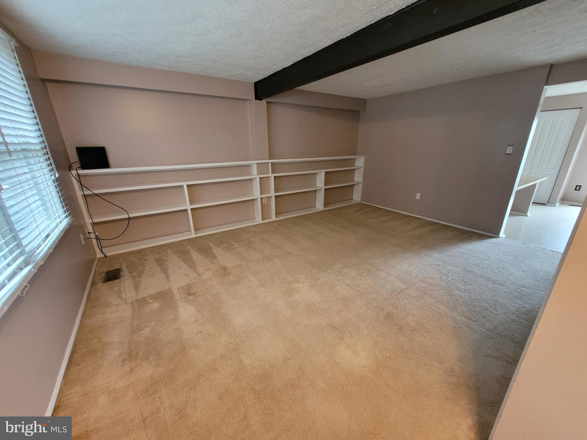 1788 Springfield Lane Frederick, MD 21702 - Photo 6 of 15 Another view of living room/long bookcases!