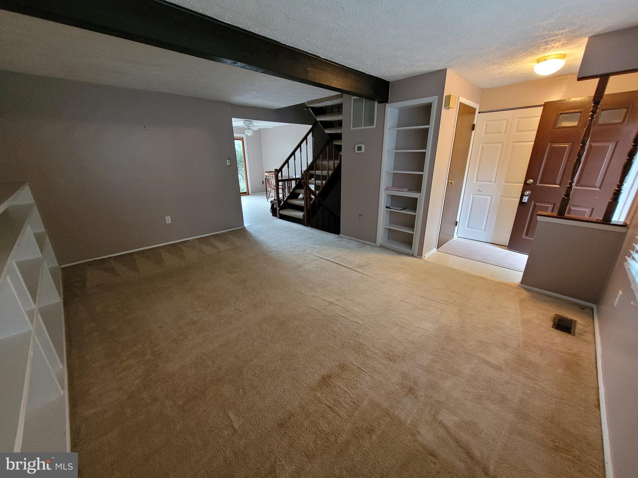1788 Springfield Lane Frederick, MD 21702 - Photo 8 of 15 Another view of the living room toward stairs.