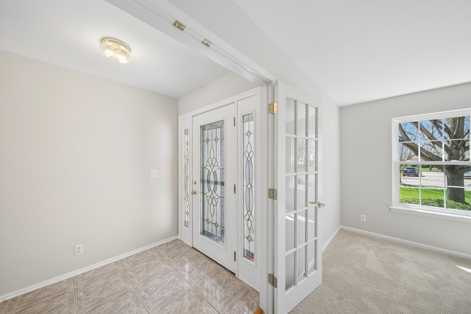 233 Spring Court North Aurora, IL 60542 - Photo 11 of 18 a view of an empty room with a window