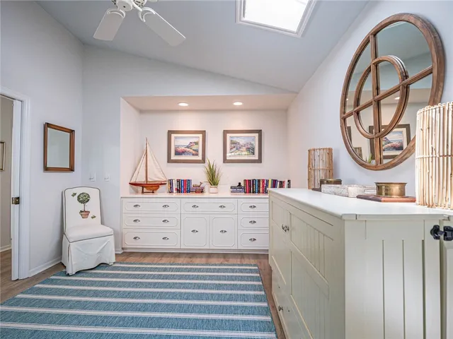 a view of bedroom with a bed and a dresser