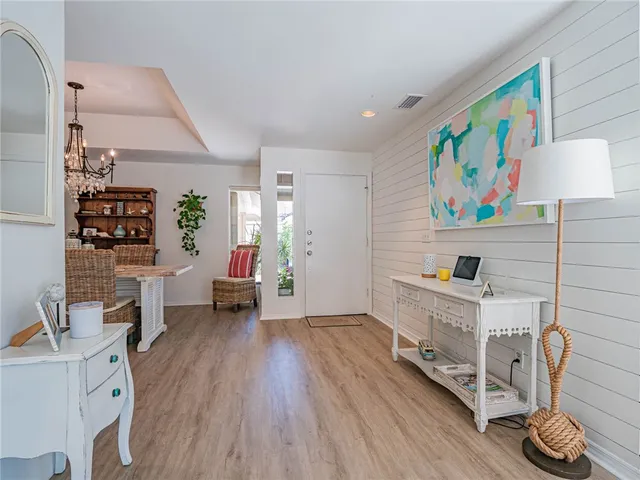 a room with furniture and a wooden floor