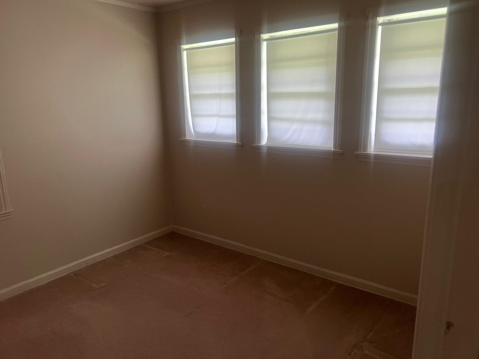 5048 Kaye Road Memphis, TN 38117 - Photo 13 of 19 an empty room with a window